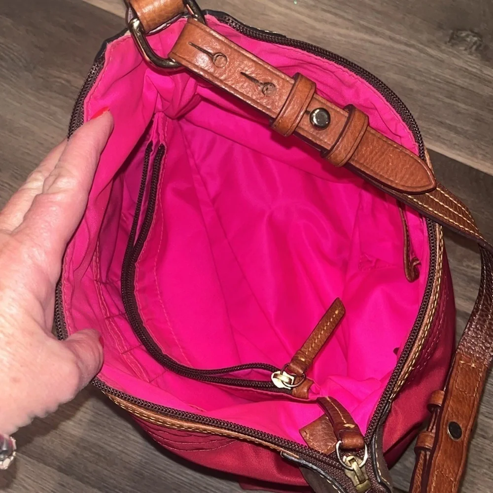 Dooney & Bourke boho sak purse in red with hot pink interior 1975 tag